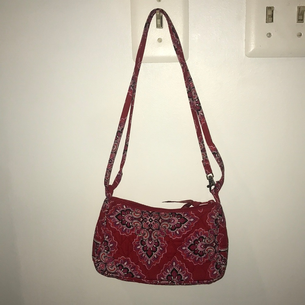 Small purse with adjustable length strap